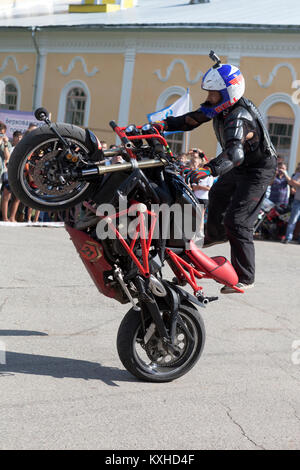 Verkhovazhye, Vologda region, Russia - August 10, 2013: Stunts on a motorcycle by Alexei Kalinin Stock Photo