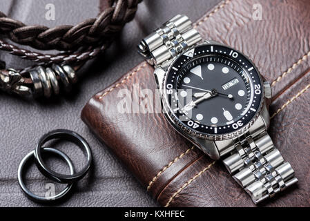 closeup men dive watch with stainless steel bracelet Stock Photo