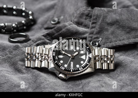 closeup men dive watch with stainless steel bracelet Stock Photo