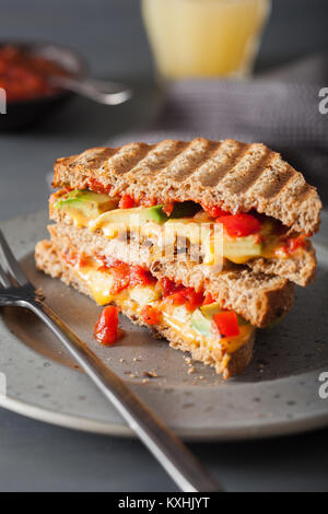 grilled cheese sandwich with avocado and tomato Stock Photo