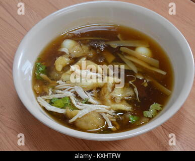 braised fish maw in red gravy on bowl Stock Photo