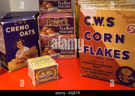 UK, Manchester, Rochdale, Toad Lane, Rochdale Pioneers Society museum, display of old CWS packaged goods, cremo oats, custard powder, pelaw tea bun ca Stock Photo