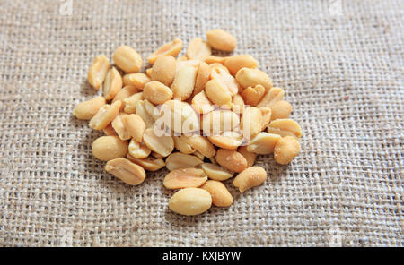 Salted peanuts on a burlap Stock Photo