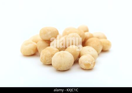 Macadamia nuts, white background Stock Photo