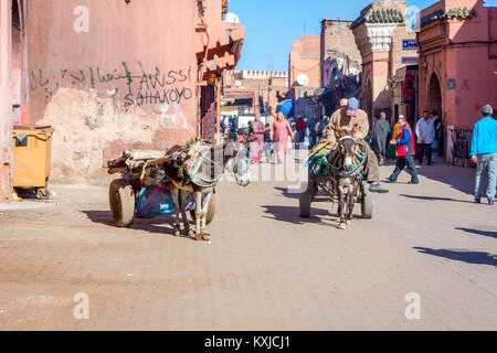 MARRAKECH, MOROCCO - DECEMBER 11: Donkey carriages on the street in Marrakech, known as red city. December 2016 Stock Photo
