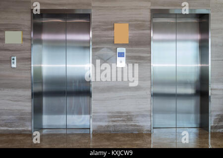 Two lift doors of office or hotel building Stock Photo