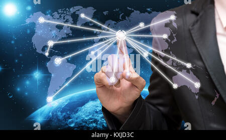 Businessman touching the center point of connection line of global network on world map with Part of earth network line background, business connectio Stock Photo