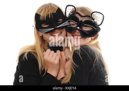 two pretty blonde Caucasian girls, dressed up as cat and mouse, isolated on white Stock Photo
