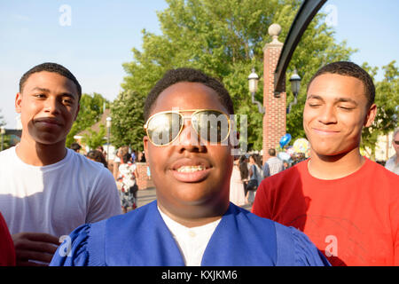 Teen boys at graduation ceremony Stock Photo