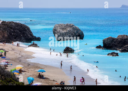 Megali Petra Lefkada, Greece - July 15, 2017: People swim in the sea at the Megali Petra Beach in Lefkada Island, Greece Stock Photo