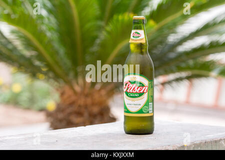 630ml bottle of Pilsen Callao lager - one of the most popular beers in Peru Stock Photo