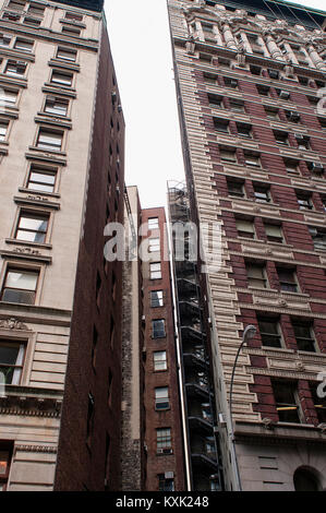 Highrise apartment in New York against blue sky, space for text Stock ...