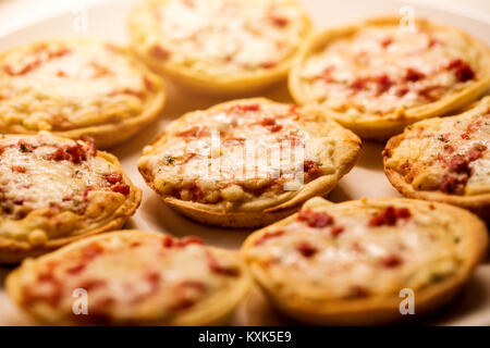 homemade mini pizza snacks on a plate Stock Photo