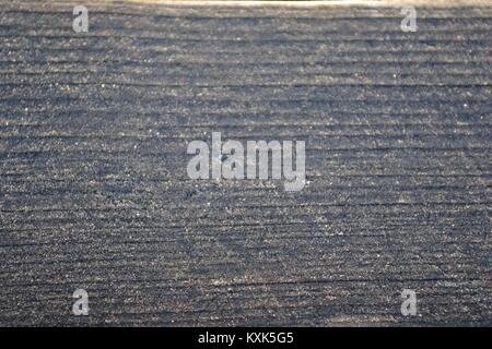 Abstract Background of Frost on Wood Grain Railing. Topsham, Devon, UK. January, 2018. Stock Photo