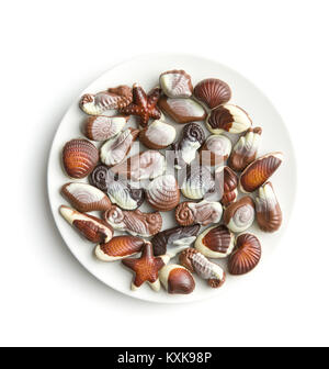 Sweet chocolate seashells isolated on white background. Stock Photo
