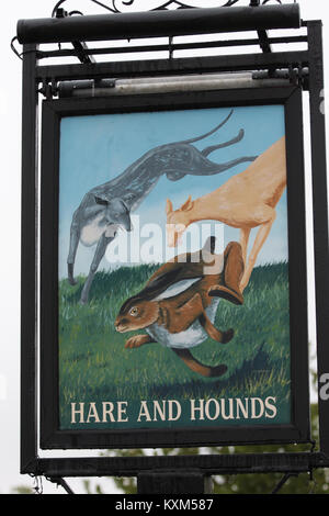 Hare and Hounds traditional pub sign painted by artist PJ Oldreive, Sway Hampshire UK Stock Photo