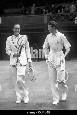 German tennis player Gottfried von Cramm (left) with Don Budge of the USA walking on to the centre court for the Men's Singles final in the All-England Chamionships at Wimbledon 1937  July 02, 1937