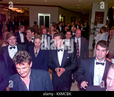 Actor Sean Penn, lower left, and John F. Kennedy, Jr. and his wife, Carolyn Bessette Kennedy depart the 1999 White House Correspondents Association Dinner at the Washington Hilton Hotel in Washington, D.C. on May 1, 1999. Credit: Ron Sachs / CNP /MediaPunch Stock Photo