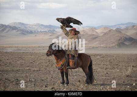 Golden eagle hunter Kazakh eagle festival Bayan Ölgii Ulgii Stock Photo