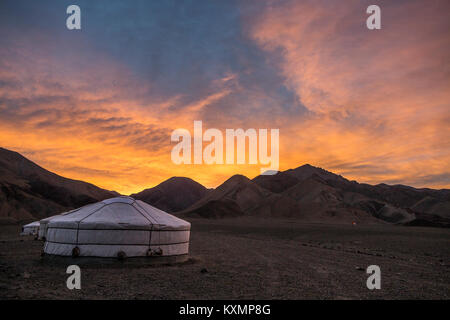 Scenic view of yurts in Altai Mountains at sunrise,Khovd,Mongolia Stock Photo