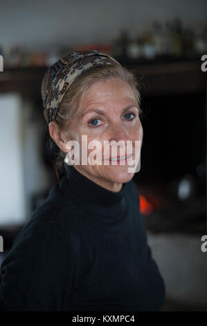 Portrait of blond haired senior woman at home Stock Photo