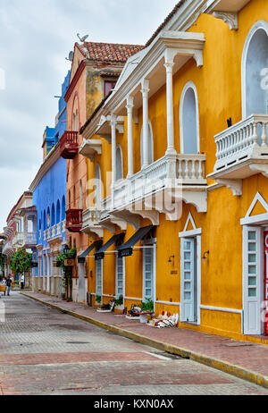 typical colorful facades with balconies of houses in Cartagena de Indias, Colombia, South America Stock Photo