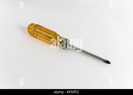 A n old and worn screw driver isolated on white background Stock Photo