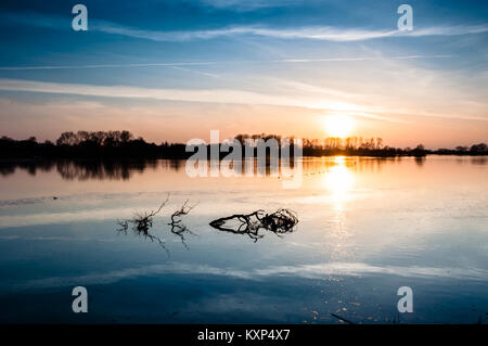 Beautiful sunset in early macrh at Wilstone Reservoir in Hertfordshire, England, now a nature reserve. Stock Photo