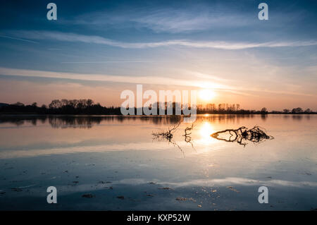 Beautiful sunset in early macrh at Wilstone Reservoir in Hertfordshire, England, now a nature reserve. Stock Photo