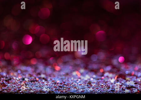 christmas background with pink and silver shiny confetti stars Stock Photo