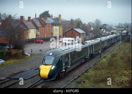 IET Class 800 011 leaves Moreton in Marsh with a GWR service from Great Malvern to London Paddington on 2 January 2018 Stock Photo