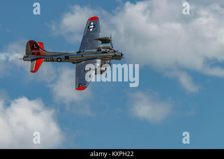 READING, PA - JUNE 3, 2017: Boening B-17G Flying Fortress 'Yankee Lady' in flight during World War II reenactment at Mid-Atlantic Air Museum Stock Photo