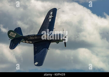 READING, PA - JUNE 3, 2017: CURTISS-WRIGHT SB2C-5 'HELLDIVER'in flight during World War II reenactment at Mid-Atlantic Air Museum Stock Photo