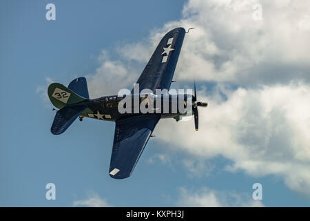 READING, PA - JUNE 3, 2017: CURTISS-WRIGHT SB2C-5 'HELLDIVER'in flight during World War II reenactment at Mid-Atlantic Air Museum Stock Photo