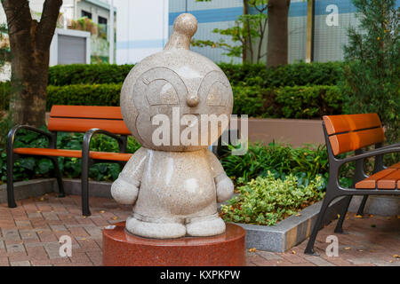 KOBE, JAPAN - OCTOBER 26: Anpanman Character in Kobe, Japan on October 26, 2014. Stone sculptures of the renowed Japanese cartoon 'Anpanman' nearby th Stock Photo