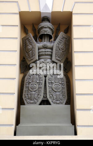 Sculpture and wall of yellow building in St-Petersburg Stock Photo