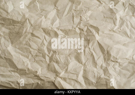 https://l450v.alamy.com/450v/kxpyya/crumpled-creased-and-unfolded-paper-background-texture-in-a-neutral-kxpyya.jpg