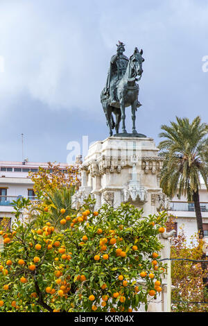 Monument to the Fernando III El Santo (Ferdinand III the Saint, King of Castile) on Plaza Nueva in Seville city, Andalusia, Spain Stock Photo