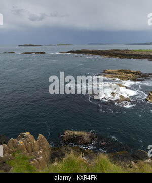 The Skerries are visible from Ramore Head, Portrush. Stock Photo