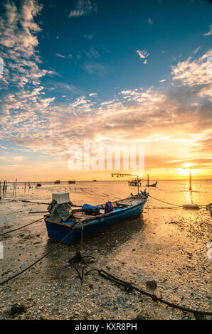 Beautiful sunset at Kuala Kedah Fishing Village. Kedah located in northern Malaysia, it is famous for rice and known as rice bowl of Malaysia. Stock Photo