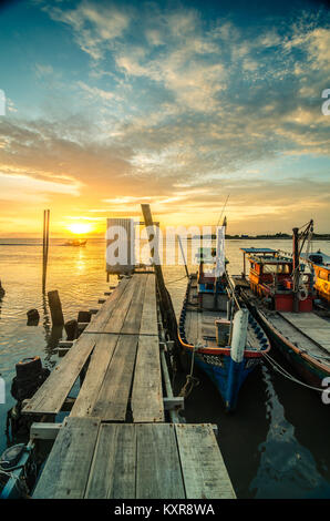 Beautiful sunset at Kuala Kedah Fishing Village. Kedah located in northern Malaysia, it is famous for rice and known as rice bowl of Malaysia. Stock Photo