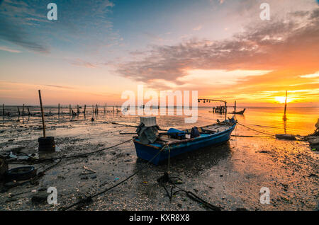 Beautiful sunset at Kuala Kedah Fishing Village. Kedah located in northern Malaysia, it is famous for rice and known as rice bowl of Malaysia. Stock Photo