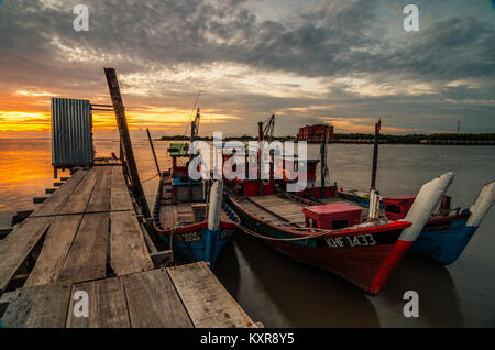 Beautiful sunset at Kuala Kedah Fishing Village. Kedah located in northern Malaysia, it is famous for rice and known as rice bowl of Malaysia. Stock Photo