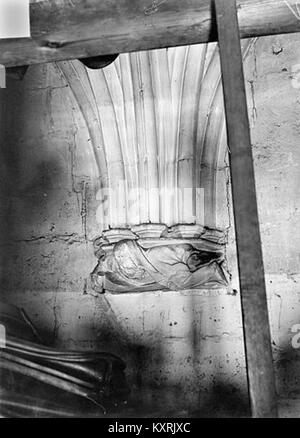A detailed image of a sculpted console featuring a human figure from the donjon of Château de Vincennes in France, highlighting the craftsmanship and ornamental stonework of medieval architecture. Stock Photo