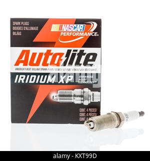 Winneconne, WI - 7 January 2018: A package of Autolite iridium spark plugs on an isolated background. Stock Photo