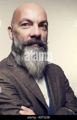 middle-aged man with beard, studio portrait Stock Photo