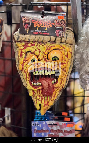 Pizza Fiend masks for sale at the Halloween adventure costume and novelty story on Broadway in Greenwich Village, New York City. Stock Photo