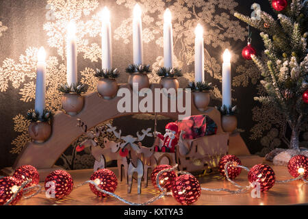 Christmas bridge lights with laser cut sleigh. Stock Photo