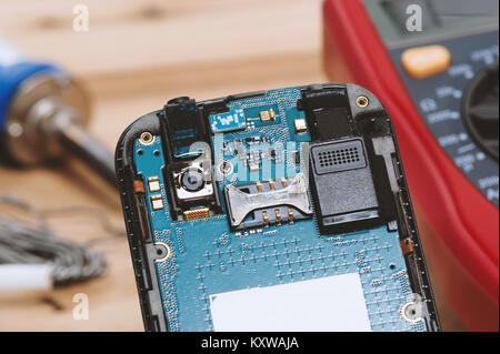 repairing the mobile phone, closeup circuit board of mobile phone Stock Photo