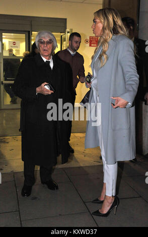 Tycoon Bernie Ecclestone and daughter Petra Ecclestone leave London's Central Family Court where she had the latest hearing in her divorce battle with ex-husband James Stunt. Stock Photo